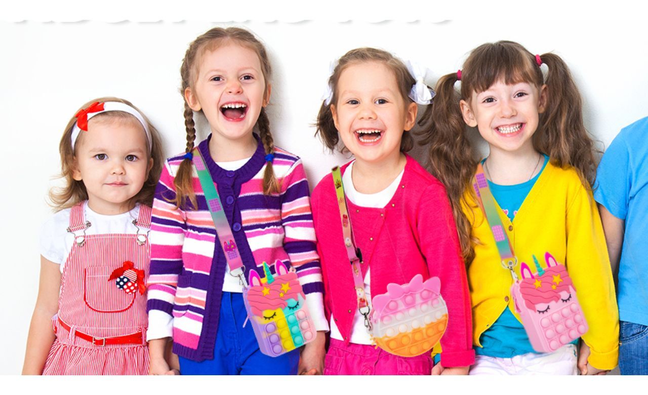 Photo of several young gals showing off their Pop It Purses